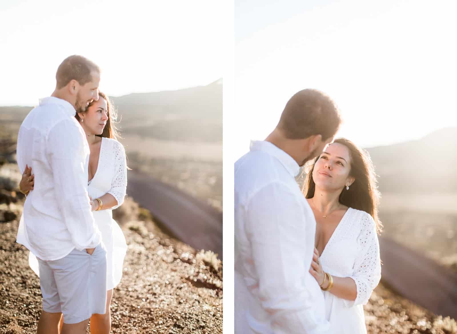 Photographie de Mathieu Dété, photographe de mariage et couple à Saint-Pierre de la Réunion 974, présentant une femme enlacée à son compagnon au lever du soleil à la Plaine des Sables